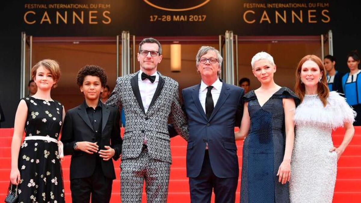 At Cannes' "Wonderstruck" screening, from left, actors Millicent Simmonds and Jaden Michael, writer Brian Selznick, director Todd Haynes and actors Michelle Williams and Julianne Moore.