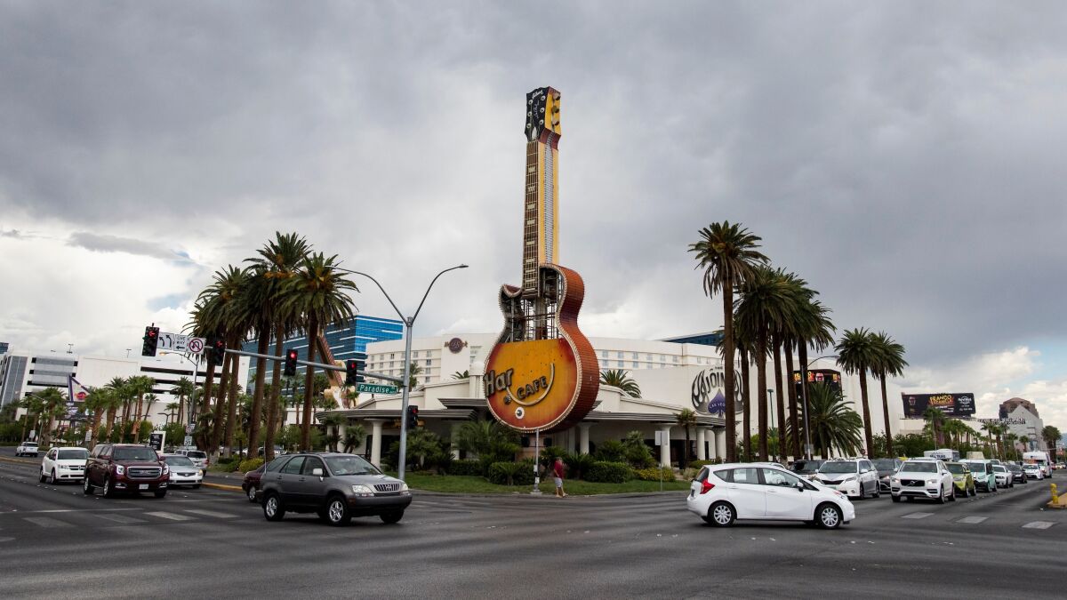 The signature electric guitar neon sign at the corner of Paradise Road and Harmon Avenue was dismantled in 2017.