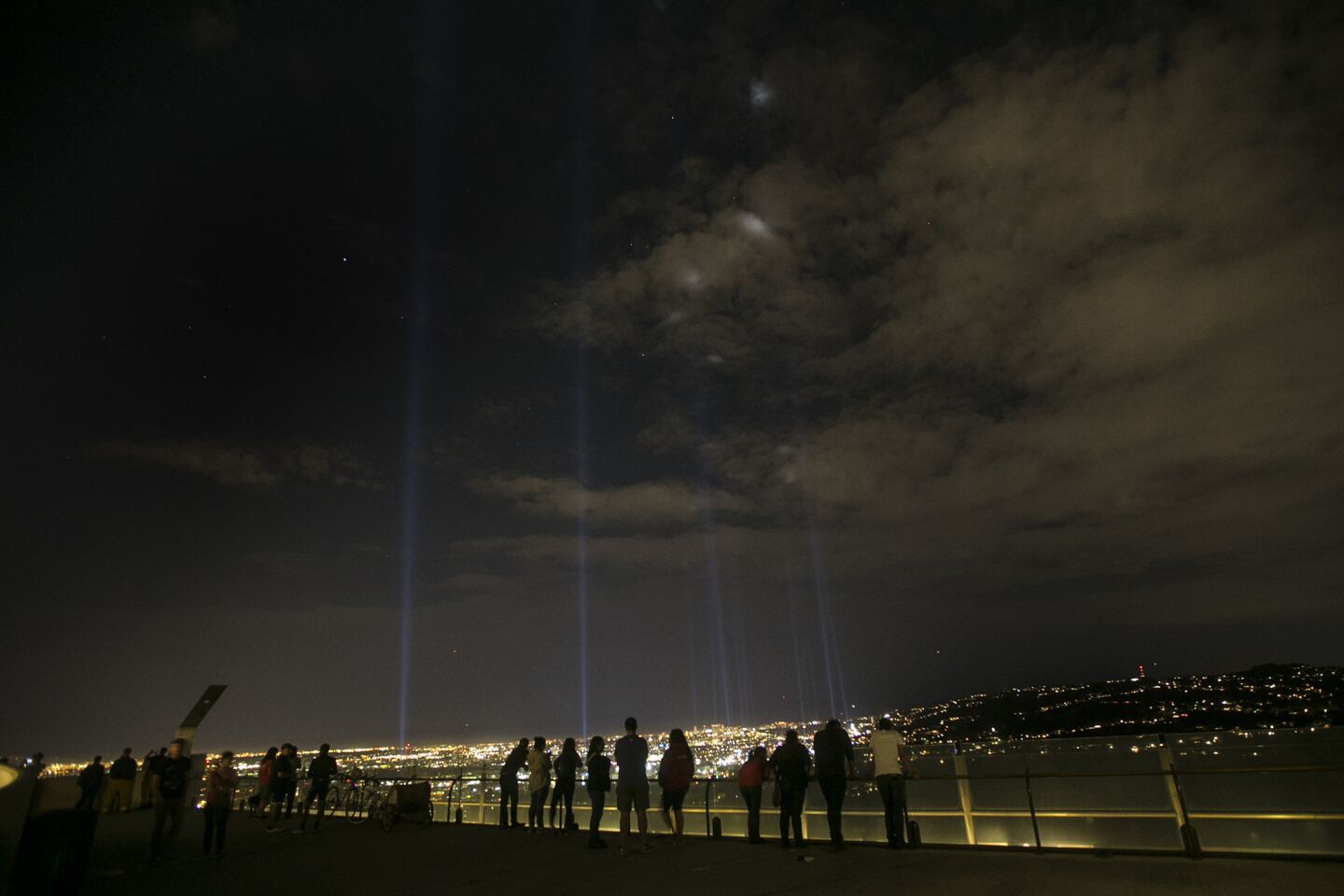 The lights, seen Friday from Griffith Observatory, illuminate the marathon route from Dodger Stadium to Santa Monica.