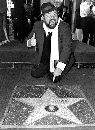 Dom DeLuise calls attention to his star on the Hollywood Walk of Fame in May 1985.