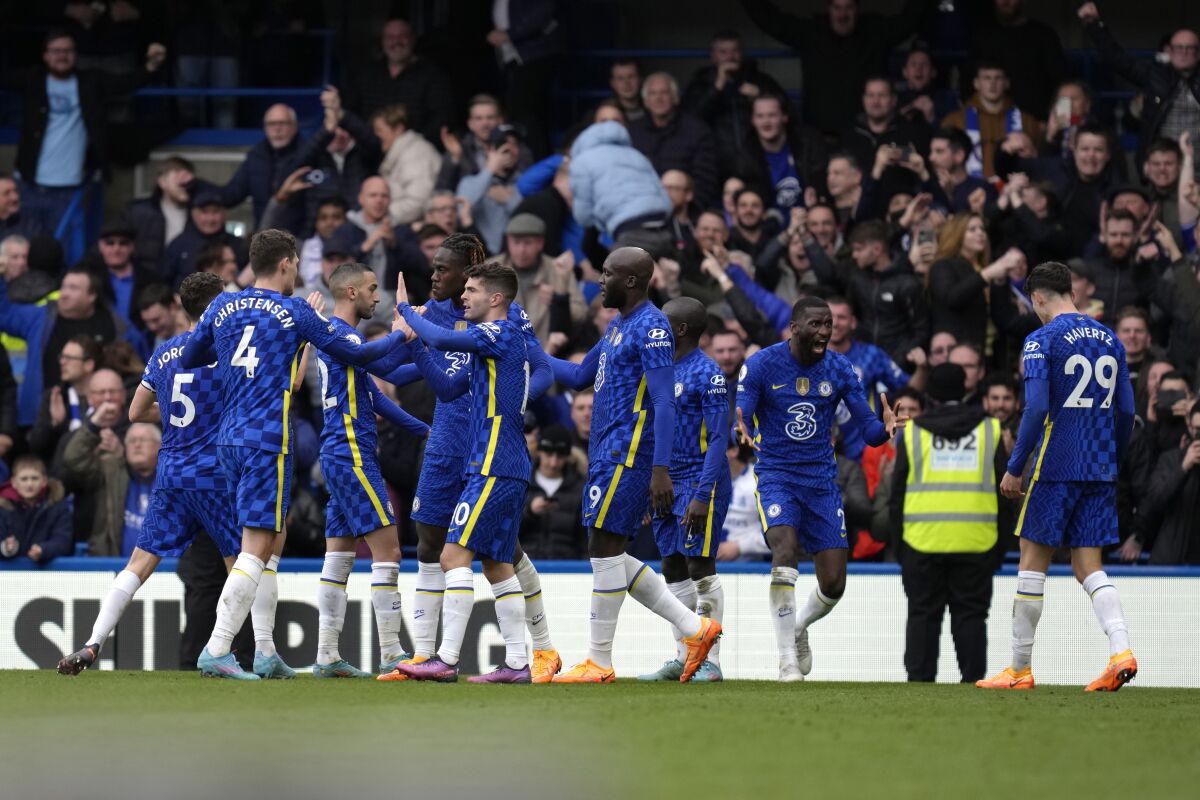 Chelsea's Kai Havertz, right, celebrates with teammates after scoring his side's first goal during the English Premier League soccer match between Chelsea and Newcastle United at Stamford Bridge stadium in London, Sunday, March 13, 2022. (AP Photo/Kirsty Wigglesworth)