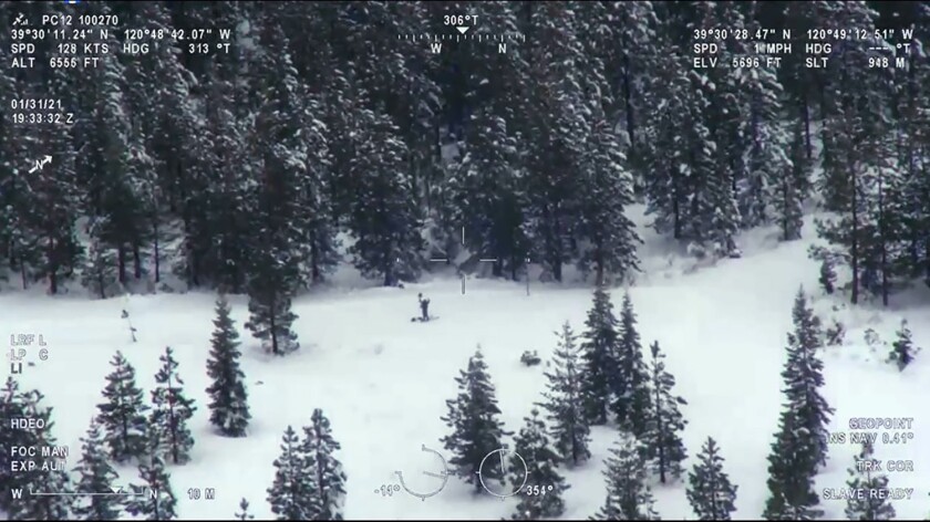 Snowy landscape with trees where a man was rescued after being stranded for seven days in the Sierra Nevada