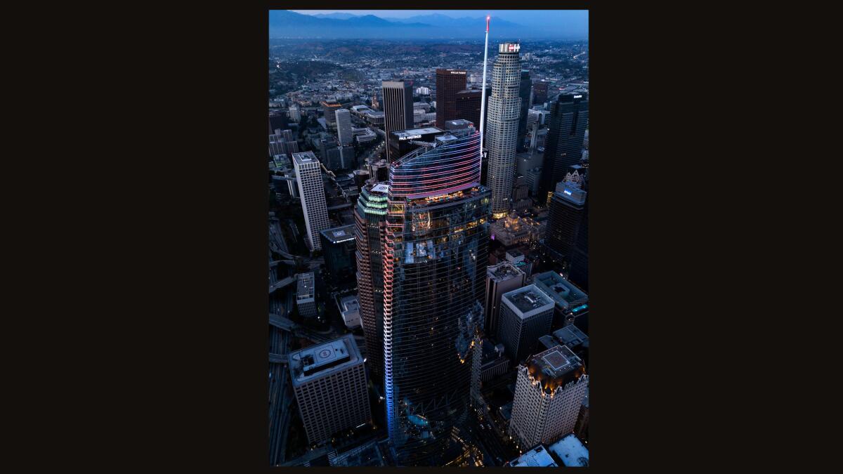 The Wilshire Grand, at 1,100 feet high, including the spire, is the tallest building west of the Mississippi. (Travis Geske / For the Times)