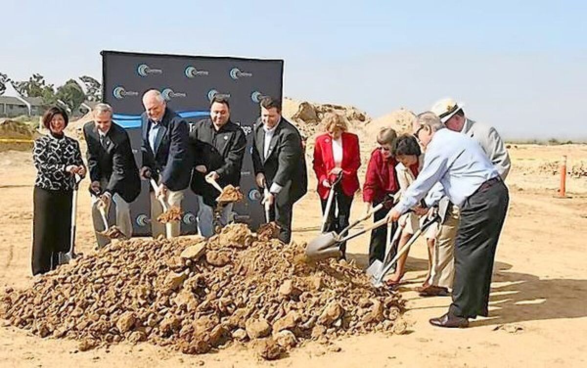 Coast Community College officials break ground on the Coastline Community College Newport campus in 2011.