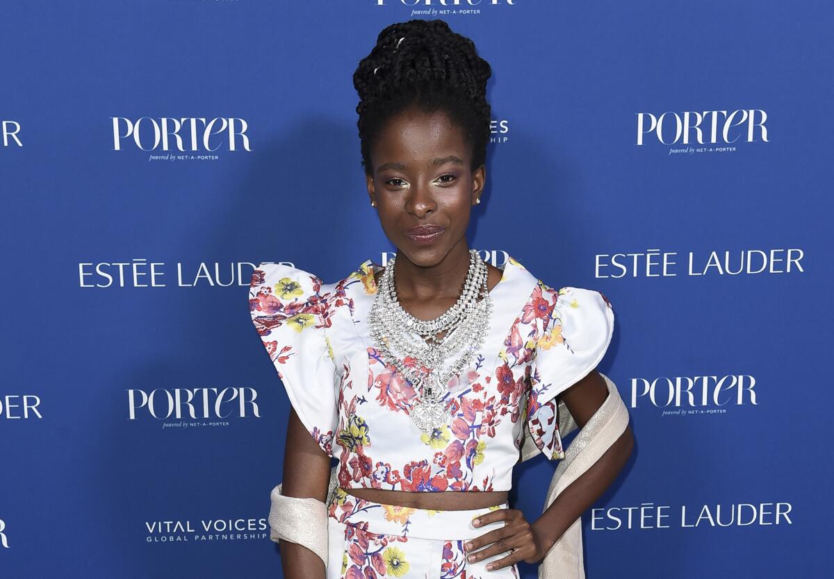 FILE - Amanda Gorman attends Porter's 3rd Annual Incredible Women Gala on Oct. 9, 2018, in Los Angeles. Gorman, who became world famous in January after reading "The Hill We Climb" at President Joe Biden's inauguration, and Penguin Random House have established the Amanda Gorman Award for Poetry, a $10,000 prize for public high school students who submit the best original work. (Photo by Richard Shotwell/Invision/AP, File)