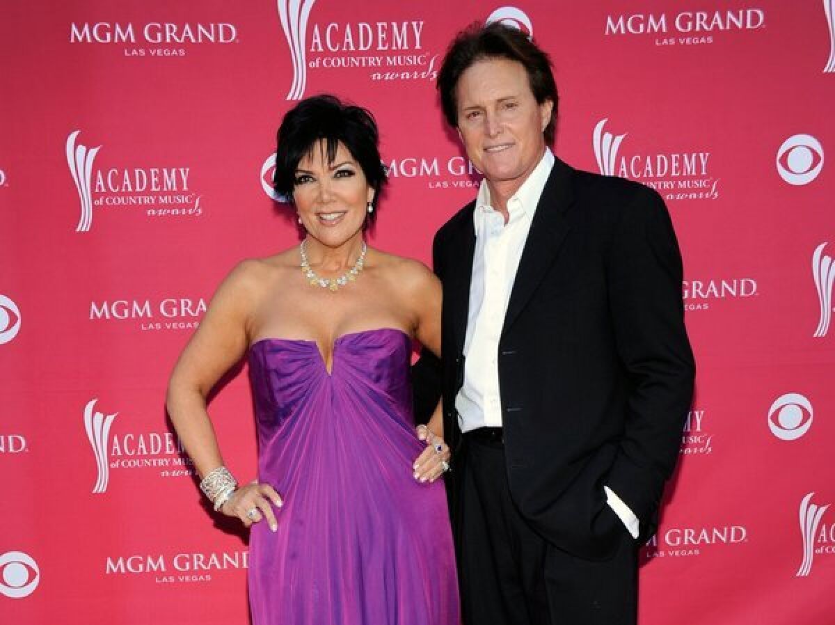 Kris and Bruce Jenner, shown here at the April 2009 Academy of Country Music Awards in Las Vegas, have confirmed that they separated about a year ago. They have been married 22 years.