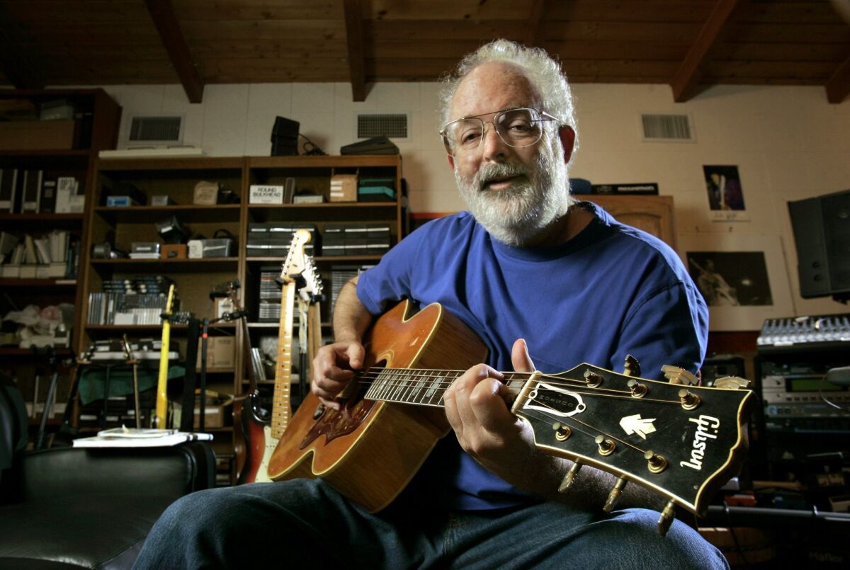 Guitar Trader, a pillar of the San Diego music scene, needs $500,000 or it will have to close, owner Eric Denton said this week. The store is well-known among music royals like singer-songwriter Jack Tempchin, pictured here, who co-wrote several of the Eagles' greatest hits.