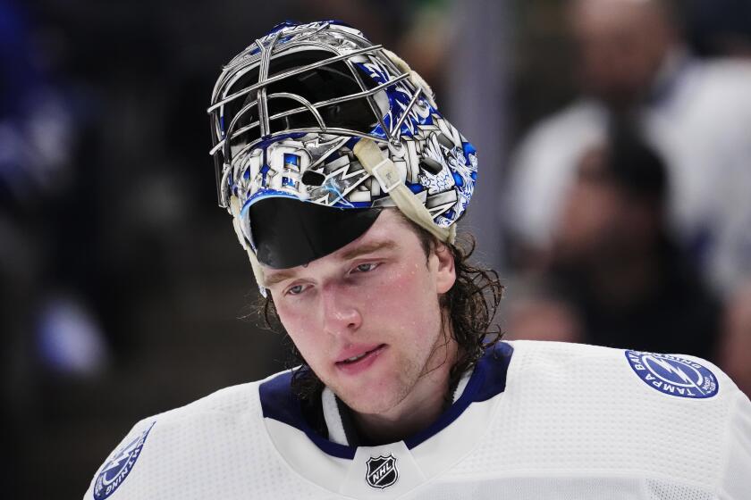 FILE - Tampa Bay Lightning goaltender Andrei Vasilevskiy pauses during a break in the second period of Game 2 of the team's NHL hockey Stanley Cup first-round playoff series against the Toronto Maple Leafs on Thursday, April 20, 2023, in Toronto. Lightning goaltender Andrei Vasilevskiy is expected to miss the first two months of the NHL season after undergoing back surgery. The team announced the stunning injury news Thursday, Sept. 28, 2023, midway through training camp and with opening night less than two weeks away. (Frank Gunn/The Canadian Press via AP, File)