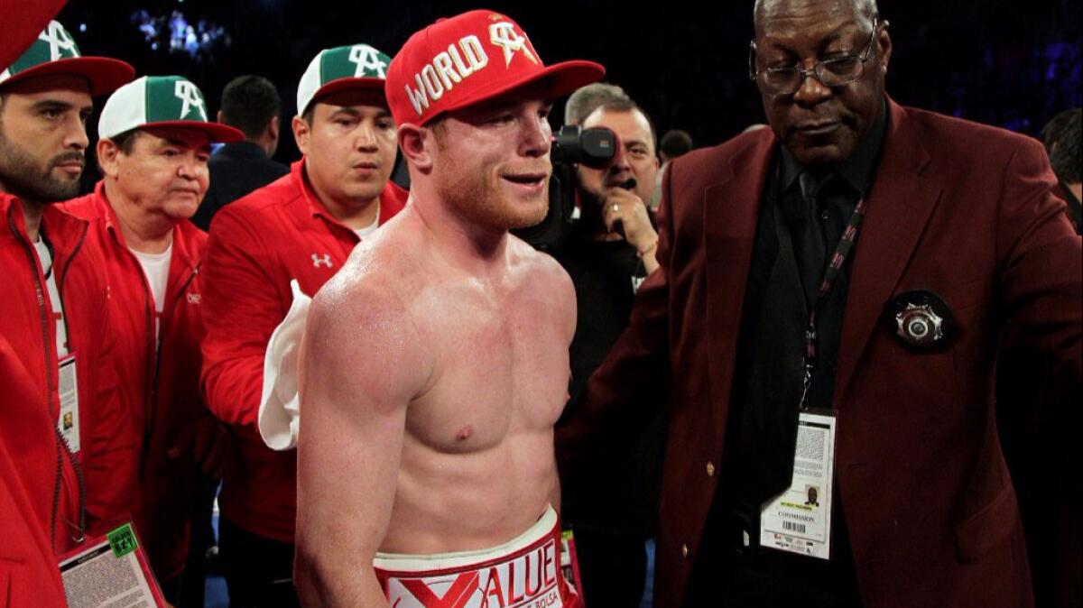 Saul "Canelo" Alvarez smiles after his knockout victory over Amir Khan in Las Vegas on May 7.
