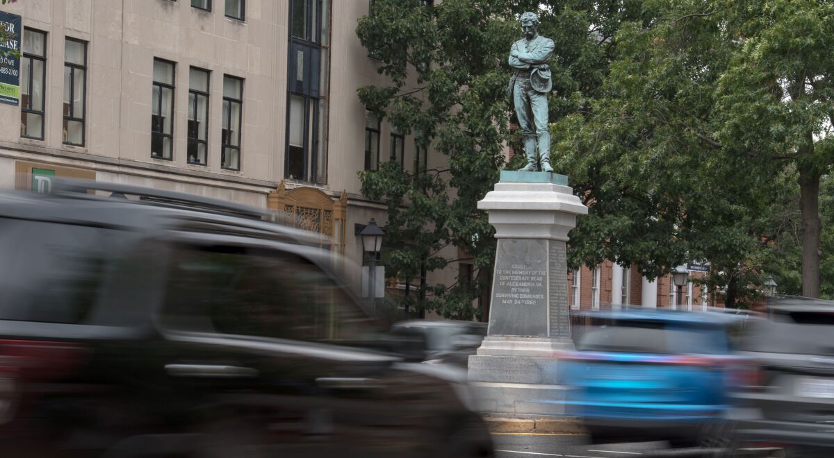 A bronze statue of a Confederate soldier in downtown Alexandria, Va., looking  south with his back to the nation's capital. 