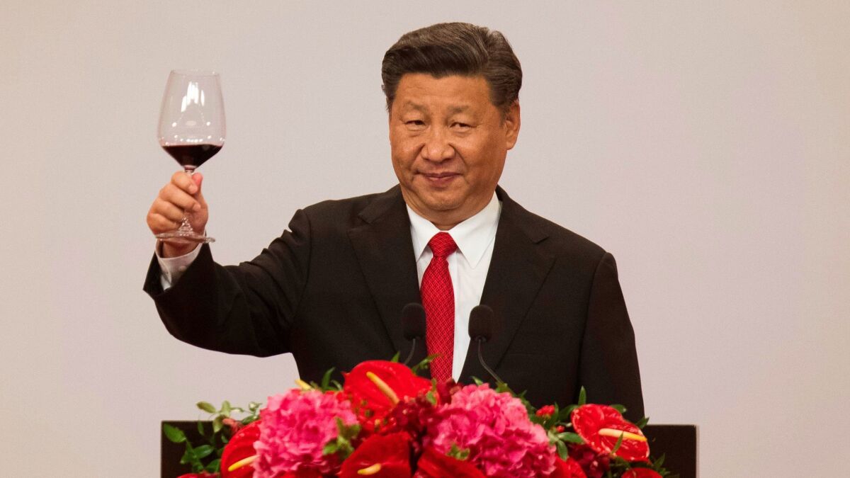 Chinese President Xi Jinping raises a toast during a banquet in Hong Kong on Friday.