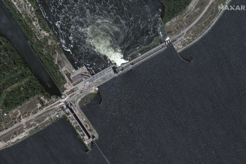 This image provided by Maxar Technologies, shows Kakhovka dam and station, Ukraine before collapse, on June 5, 2023. (Satellite image ©2023 Maxar Technologies via AP)