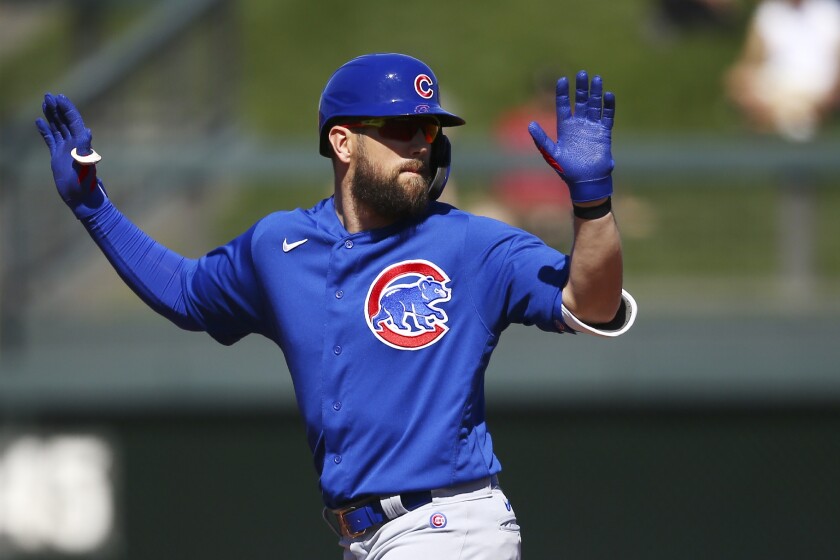 Steven Souza Jr. calls for a timeout as he stands on second base during a spring training game with the Chicago Cubs.