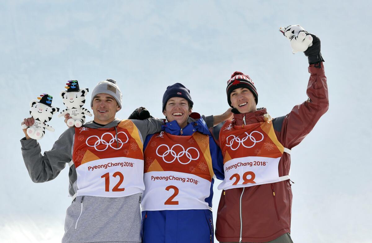 Silver medal winner Nick Goepper, gold medal winner Oystein Braaten, of Norway, and bronze medal winner Alex Beaulieu-Marchand, of Canada,.