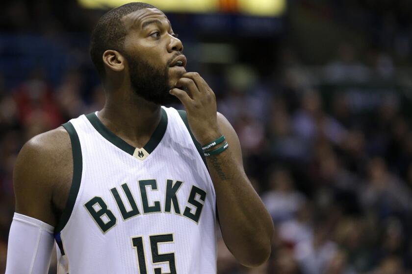 Milwaukee Bucks' Greg Monroe looks during the first half of a game against the Golden State Warriors on Saturday.