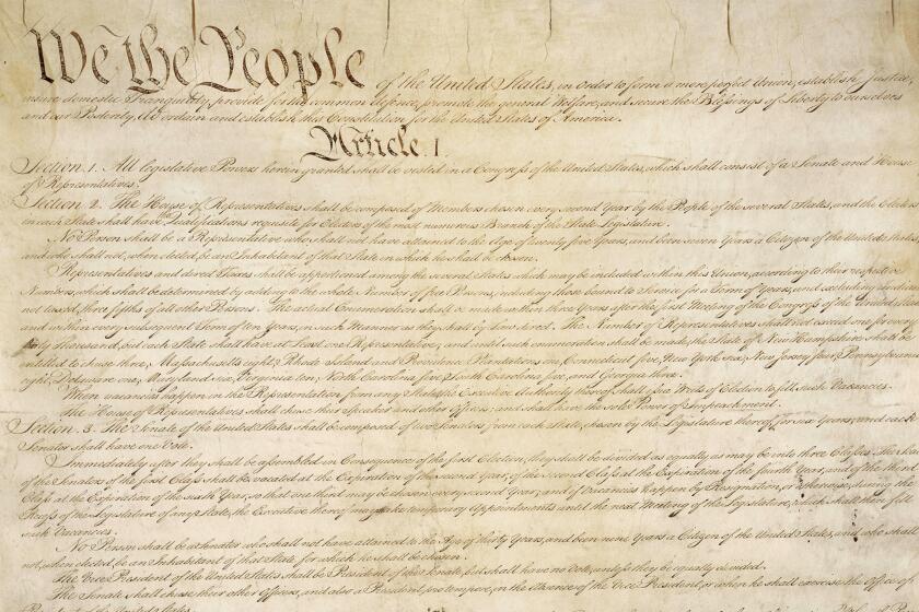 This photo made available by the U.S. National Archives shows a portion of the first page of the United States Constitution. Sotheby's announced Friday that in November it will put up for auction one of just 11 surviving copies of the Constitution from the official first printing produced for the delegates to the Constitutional Convention and for the Continental Congress. It's the only copy that remains in private hands and has an estimate of $15 million-$20 million. (National Archives via AP)
