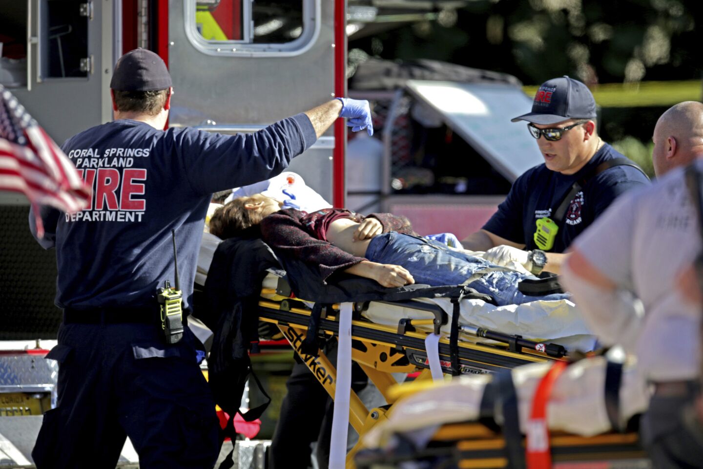 Medical personnel tend to a victim after the mass shooting.
