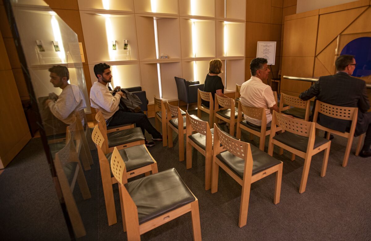 Members of the public participate in a mindfulness training class inside the chapel at UCLA Reagan Medical Center on Sept. 23 in Westwood.
