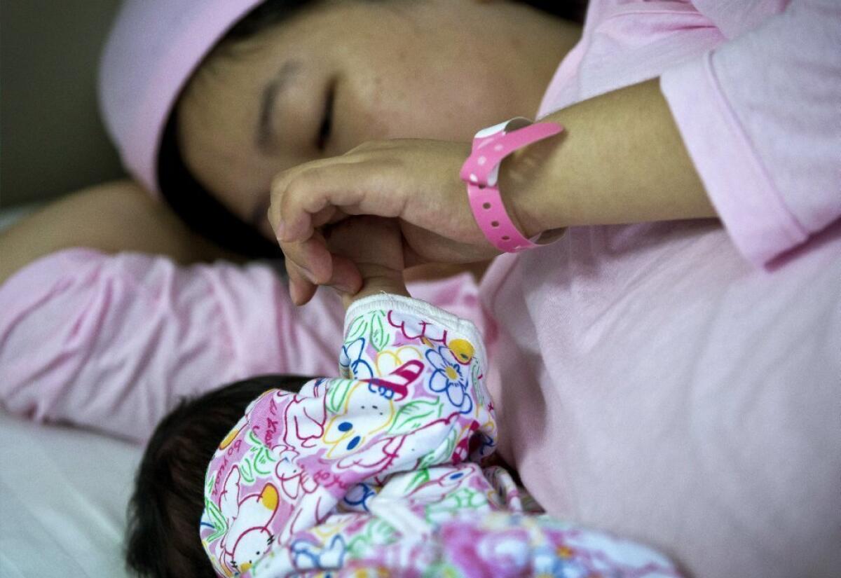 A new study links bed-sharing with longer periods of breast-feeding, but its authors caution that the practice, also known as co-sleeping, poses safety concerns.