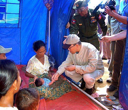 United Nations Secretary General Ban Ki-Moon visits a mother and her baby in a cyclone relief camp in Dedaye, Myanmar. Ban Ki-moon toured Myanmar's disaster area, and said he had come bearing a "message of hope" after the tragedy, which has left nearly 134,000 people dead or missing.