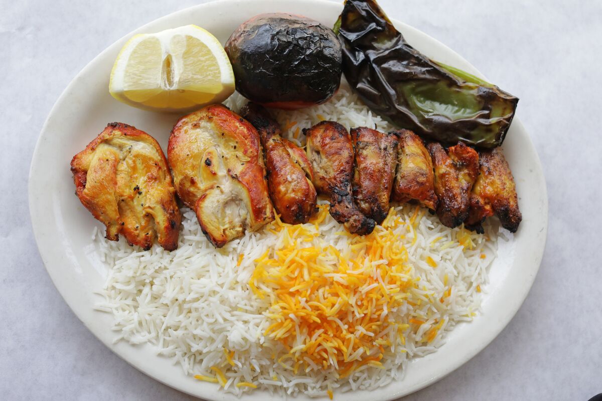 Chicken, a kabob, rice and veggies at Raffi's Place in Glendale