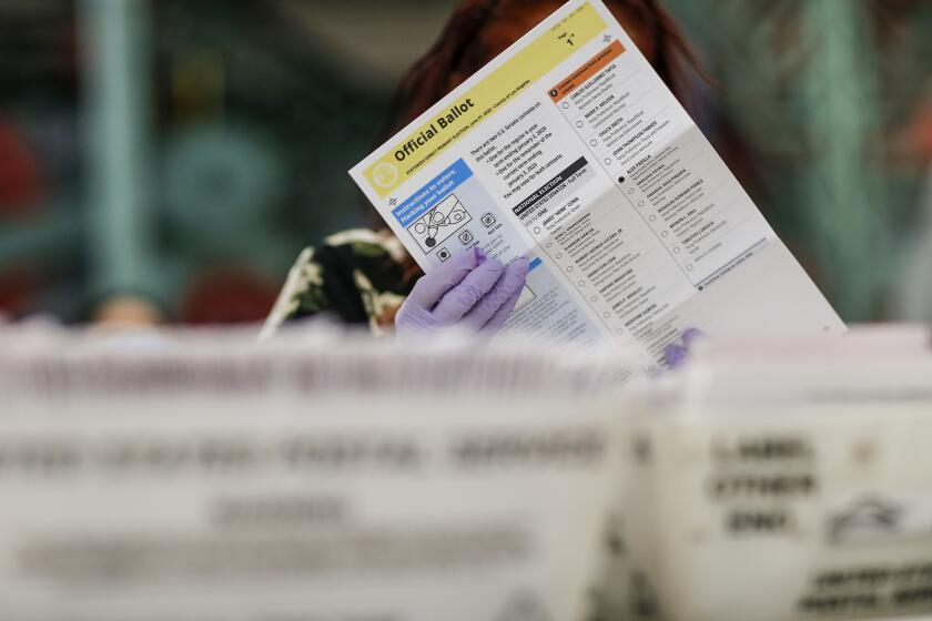 Industry, CA, Thursday, June 16, 2022 - Mail in ballots are processed at a County facility where they are received from the post office, opened, sorted and verified then sent to be counted in Downey. (Robert Gauthier/Los Angeles Times)