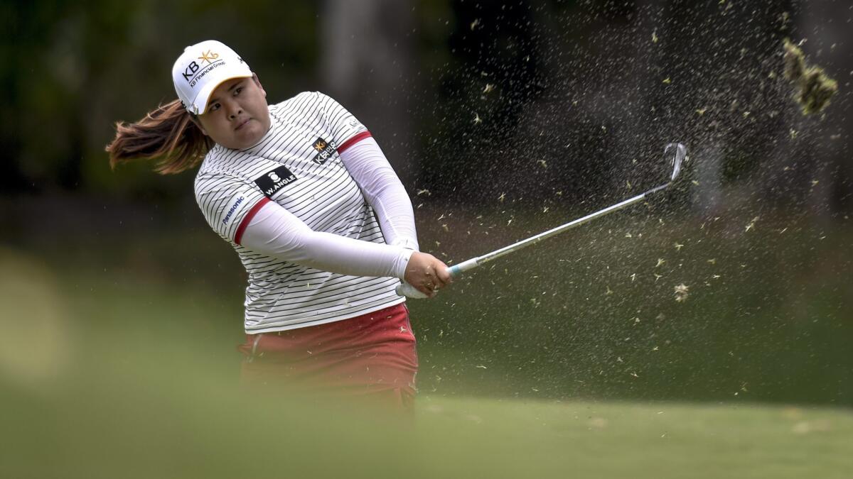 Inbee Park hits from the 10th hole fairway during the third round of the HSBC Women's Champions in Singapore on Saturday.