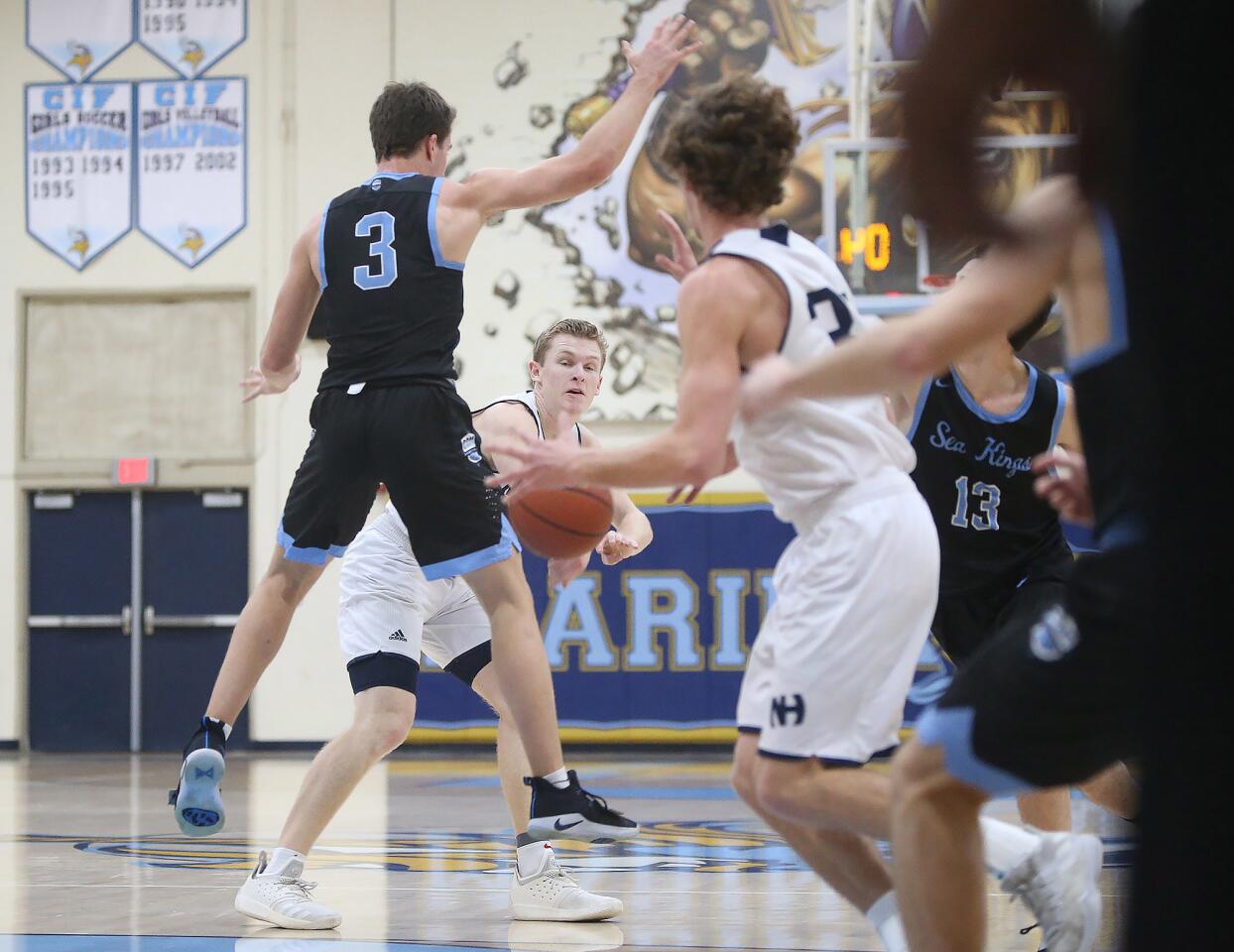 Photo Gallery: Corona del Mar vs. Newport Harbor in boys’ basketball