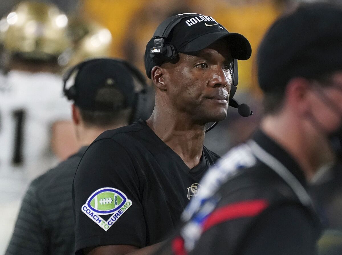 Colorado head coach Karl Dorrell watches his defense against Arizona State's offense during the second half of an NCAA college football game Saturday, Sept. 25, 2021, in Tempe, Ariz. (AP Photo/Darryl Webb)