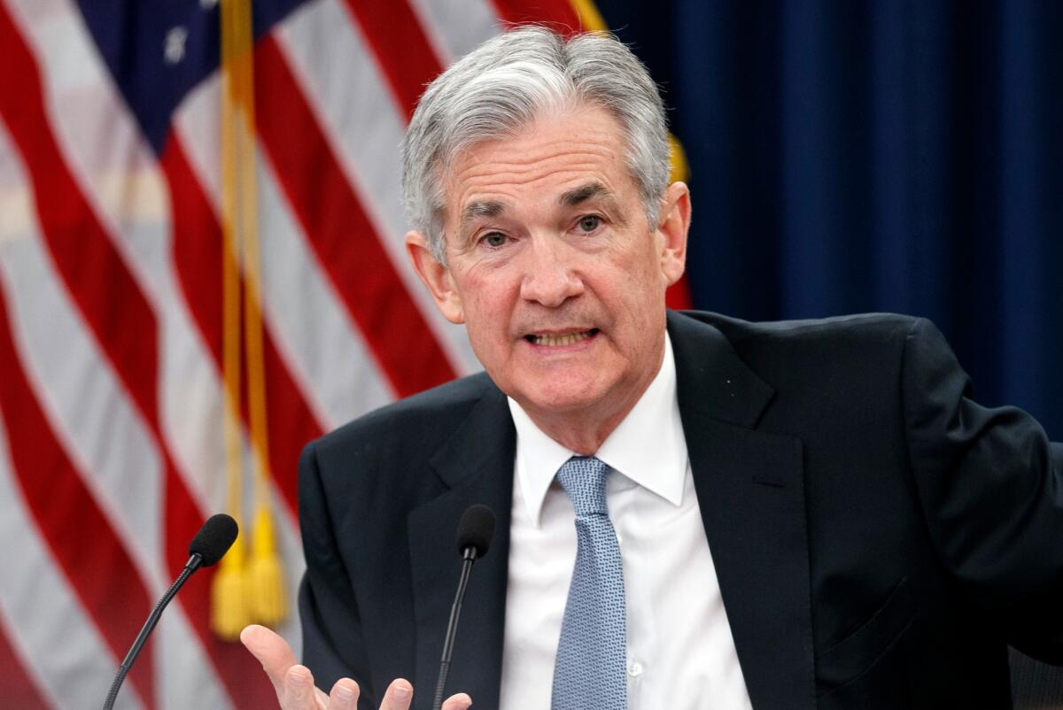 Federal Reserve Chairman Jerome H. Powell speaks in Washington at a news conference after a policy meeting.