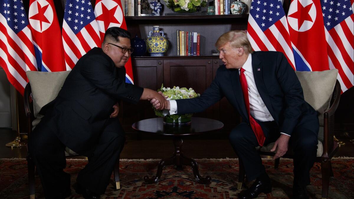 President Donald Trump meets with North Korean leader Kim Jong Un on June 12, in Singapore.