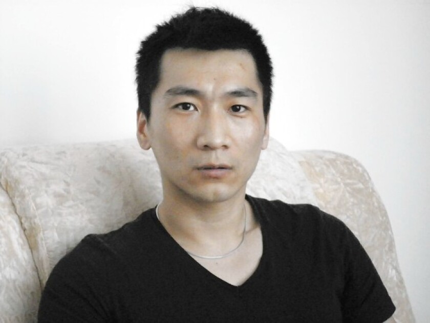 THERAPIST: Liu Chunjian works with gay youth.