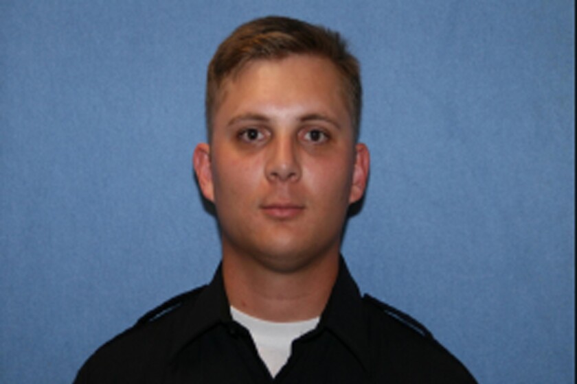 In this undated photo provided by the Phoenix Police Department is Officer Ginarro New. The Phoenix police officer died after being hit by a driver who ran a red light and also died, authorities said Tuesday, June 1, 2021. The crash happened Monday night after 27-year-old Officer New entered an intersection and his police SUV was hit by another car, Phoenix police said in a statement. (Phoenix Police Department via AP)