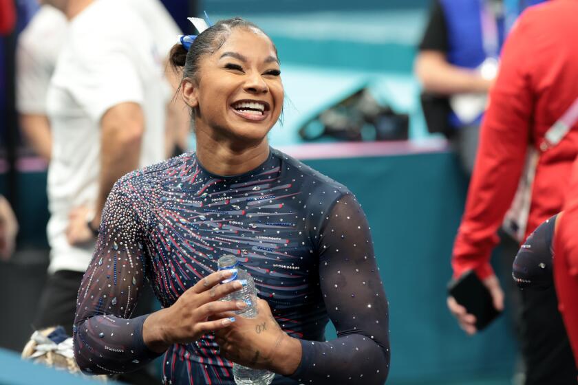 PARIS, FRANCE July 24, 2024-U.S. gymnast Jordan Chiles smiles during podium training.