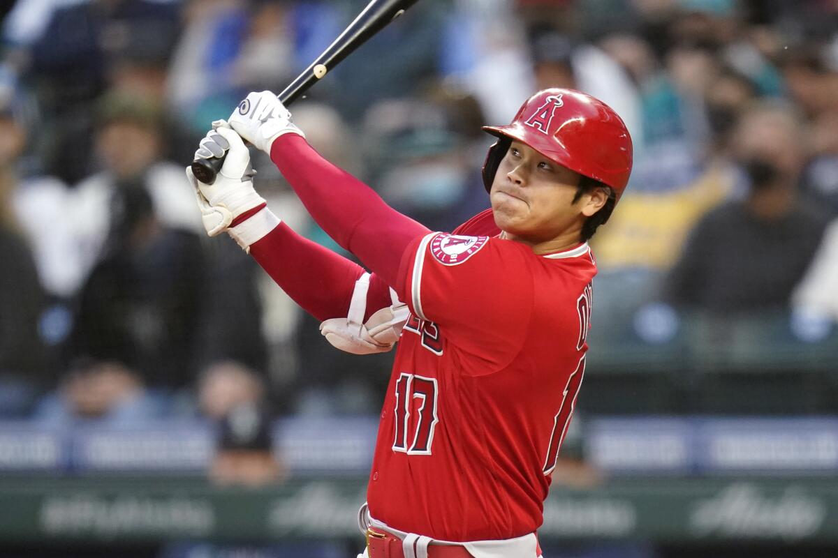 Angels star Shohei Ohtani hits against the Seattle Mariners on Oct. 2.