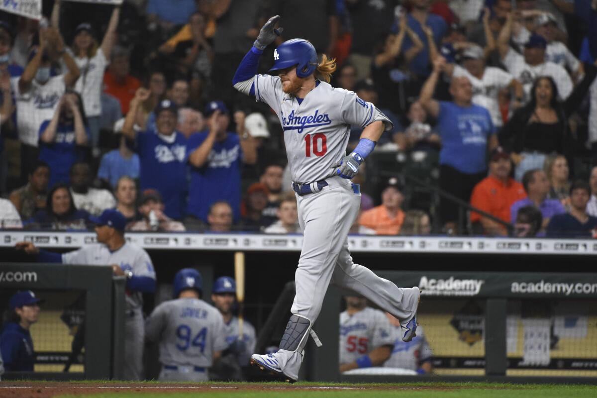 Dodgers third baseman Justin Turner celebrates after hitting a two-run home run.