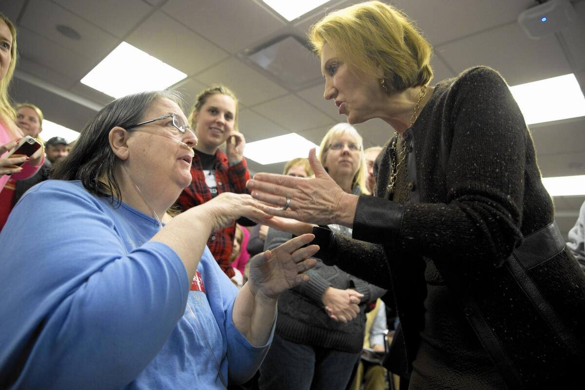 Carly Fiorina greets a supporter during a campaign event at Iowa State University on Saturday.