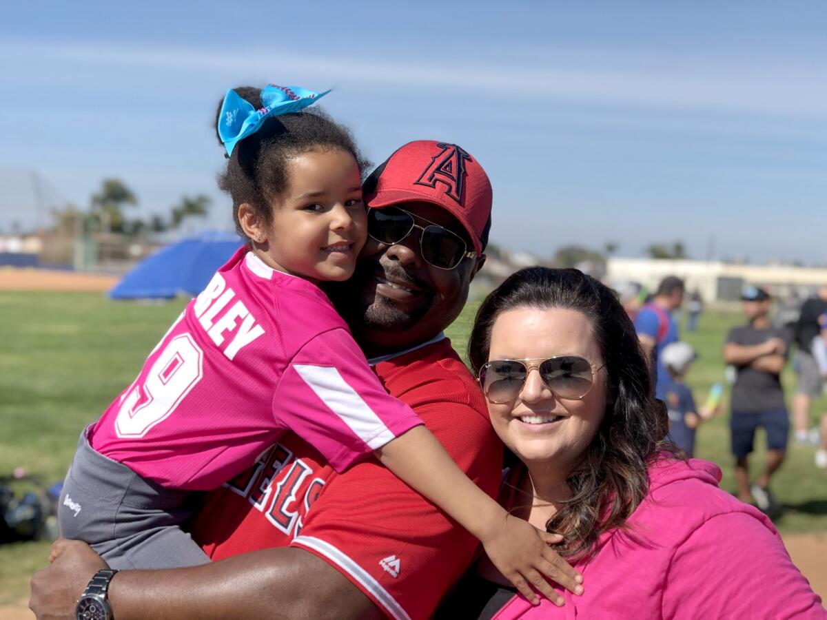 Kevin Fairman with his daughter Marley and wife Brooke.