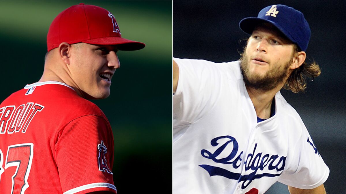 Angels outfielder Mike Trout, left, and Dodgers pitcher Clayton Kershaw have been named Los Angeles' 2014 sportsmen of the year by the L.A. Sports Council.