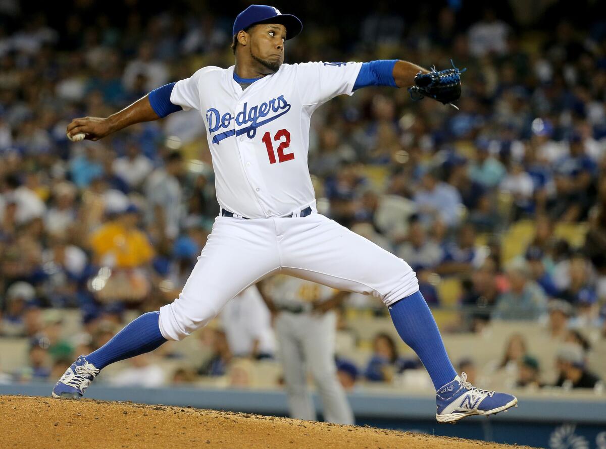 Dodgers reliever Juan Nicasio pitches against the Athletics on July 29 at Dodger Stadium.