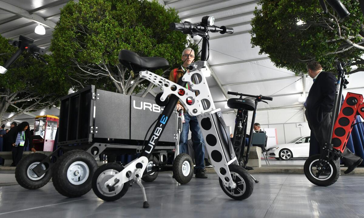 The Urb-E electric folding bicycle is on display.