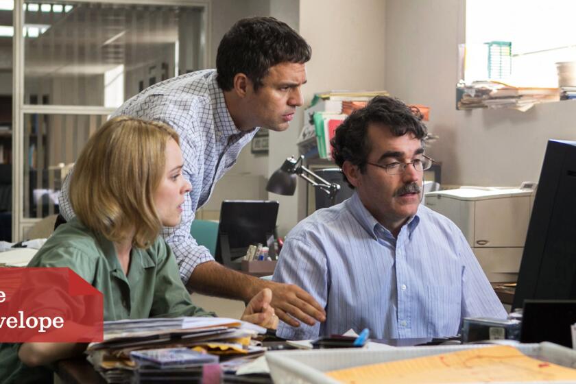 Rachel McAdams, Mark Ruffalo, center, and Brian d’Arcy James play Boston Globe journalists documenting sex abuse by priests in "Spotlight."