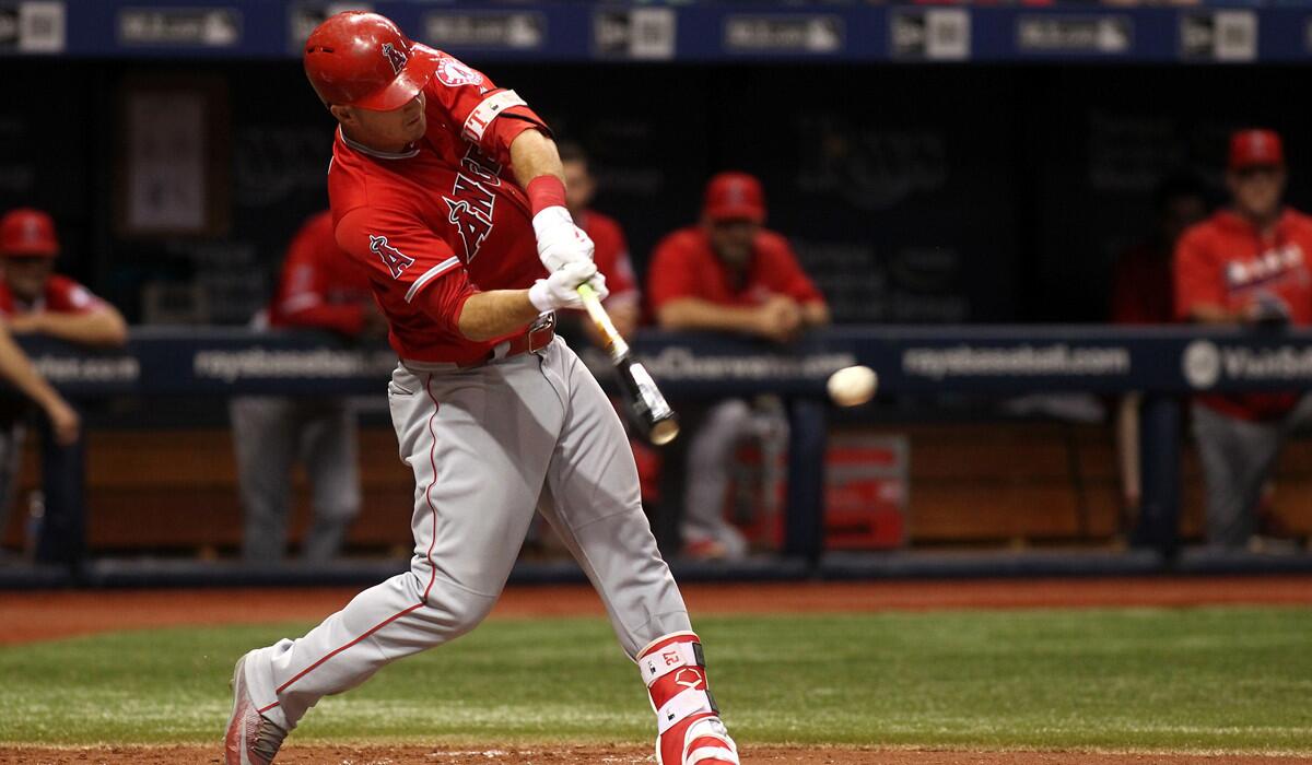The Angels' Mike Trout hits into a fielder's choice during the third inning, a play on which two runs scored.