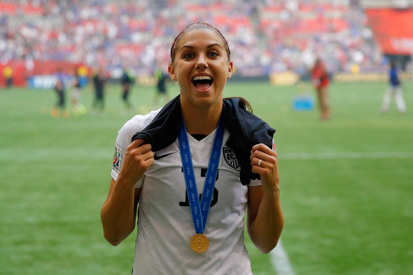 VANCOUVER, BC - JULY 05: Alex Morgan #13 of the United States celebrates the 5-2 victory against Japan in the FIFA Women's World Cup Canada 2015 Final at BC Place Stadium on July 5, 2015 in Vancouver, Canada. (Photo by Kevin C. Cox/Getty Images) ** OUTS - ELSENT, FPG - OUTS * NM, PH, VA if sourced by CT, LA or MoD **