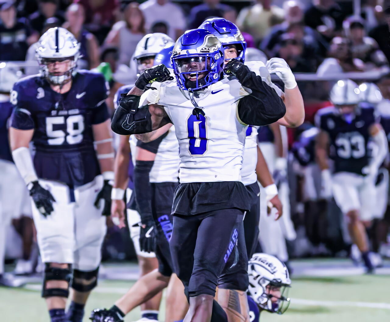 Santa Margarita freshman linebacker Aydan Steen celebrates on the field during a game.