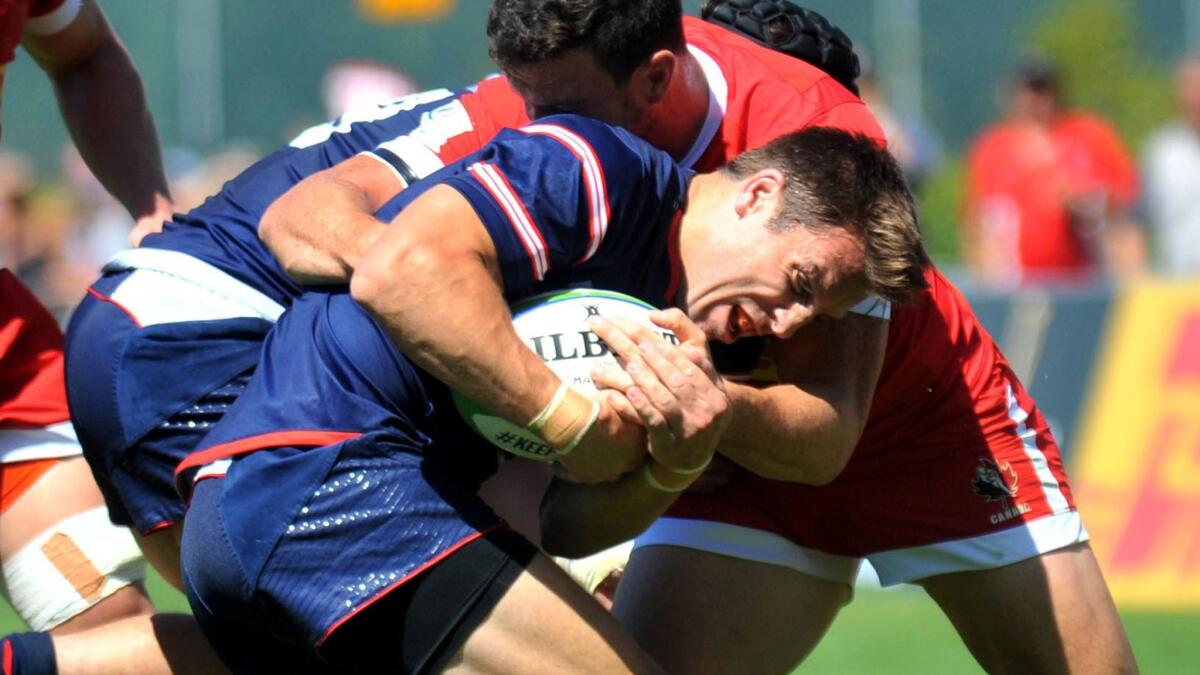 U.S. captain Chris Wyles is stopped during a 15-13 victory over Canada in the World Rugby Pacific Nations Cup on Aug. 3.