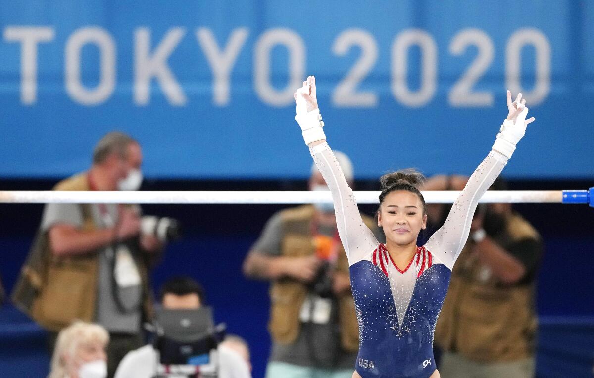 Sunisa Lee finishes on the uneven bars during the women's all-around gymnastics final on Thursday.