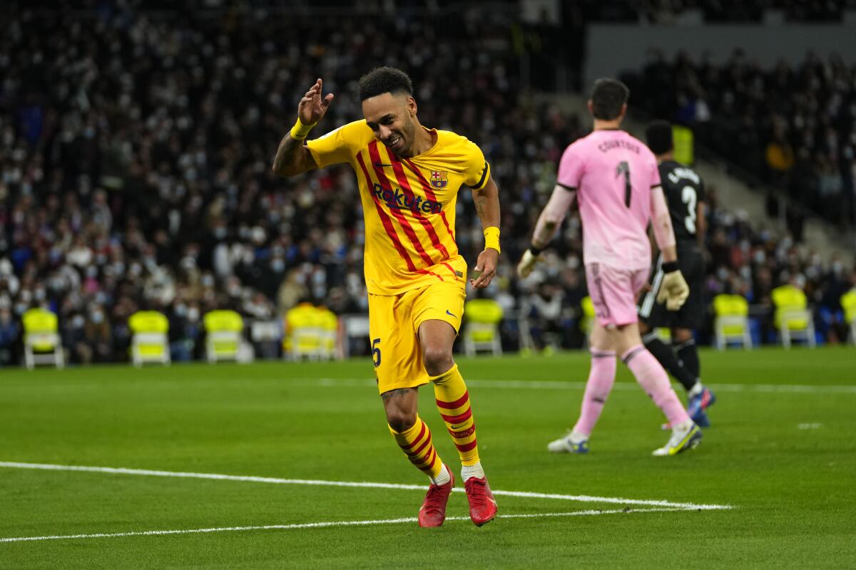 Soccer-Dembele strike gives Barcelona narrow win over Atletico