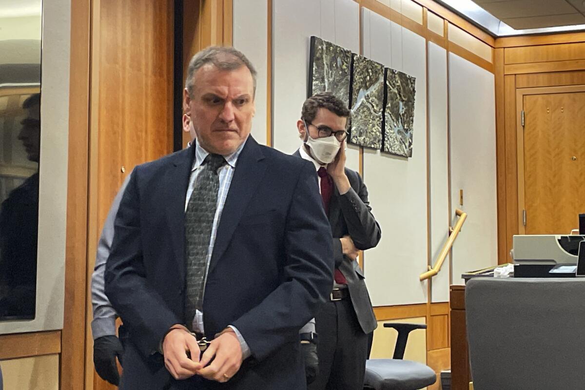 FILE - Brian Steven Smith arrives in a courtroom after a break, Tuesday, Feb. 6, 2024, in Anchorage, Alaska. Smith, who recorded the violent death of an Alaska Native woman on his cellphone, was found guilty of two counts of first-degree murder, Thursday, Feb. 22, 2024, in her death and that of another Alaska Native woman. (AP Photo/Mark Thiessen, File)