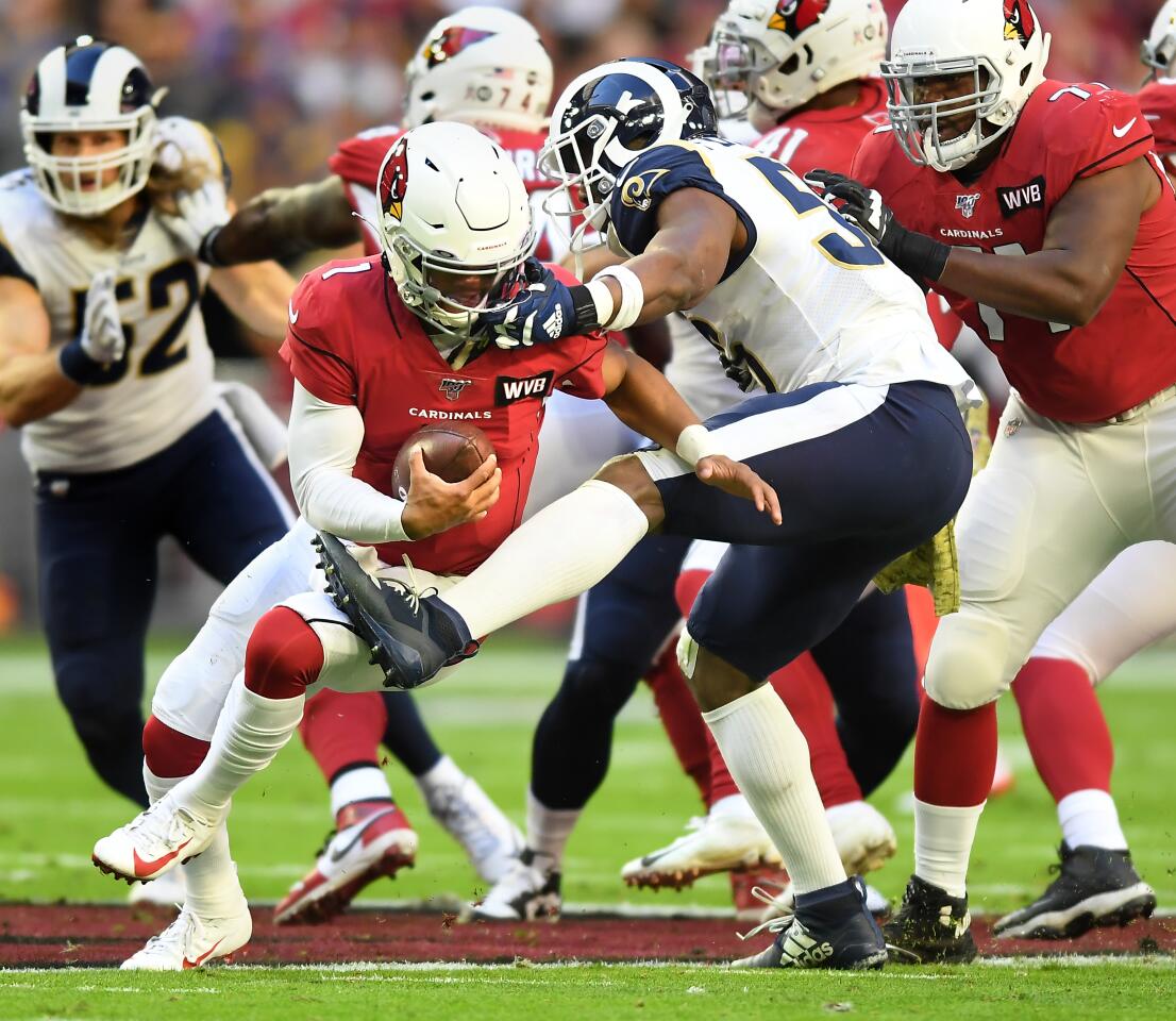 Rams linebacker Dante Fowler Jr. sacks Cardinals quarterback Kyler Murray.